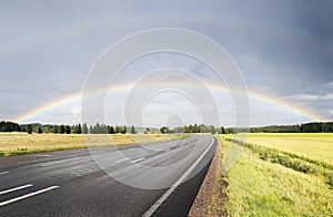 Double rainbow over the road