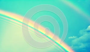 Double rainbow in sky with clouds