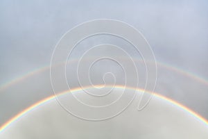 Double rainbow in the sky after rain