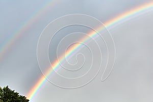 Double rainbow in the sky after rain