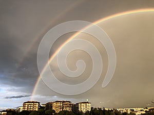 Double rainbow after storm over the city of Rome