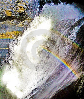 Double Rainbows at Trummelbach falls, Interlaken, Bern canton, Switzerland, waterfall in the mountain of Lauterbrunnen valley