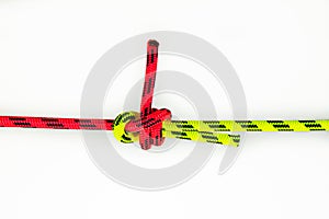 Double Sheet, becket bend or weaver`s hitch binding two colored red and green ropes. knot use for joining lines of