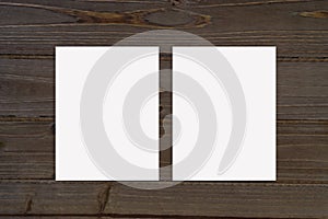 Double Sided Poster Mockup on Rustic Brown Background with Copy Space
