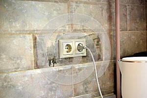 Double socket built into the wall.