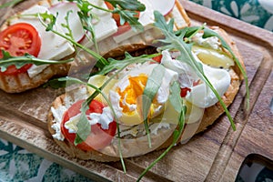 Double toast with egg, aragula, tomato and cheese,French toast bread with veggies