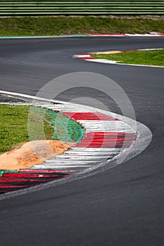 Double turn chicane asphalt track motor sport circuit surface level view