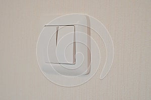 Double white light switch on a light background