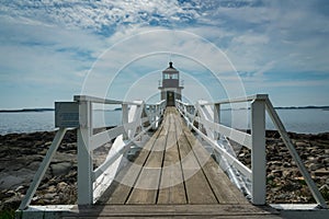 Doubling Point Lighthouse in Maine under dramatic sky