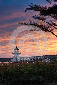 Doubling Point Lighthouse With Walkway and Tree in Sunset