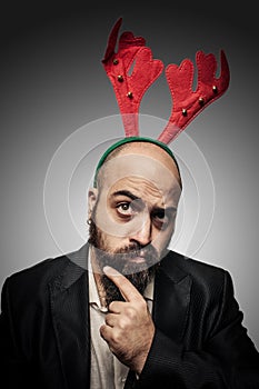 Doubt christmas bearded man with funny expressions