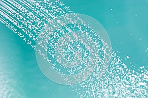 Douche water drops, emerald background