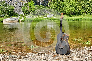 Dougara guitar against the backdrop of nature. Incendiary music