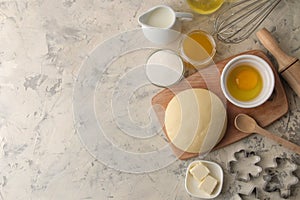 Dough for baking. making delicious cookies. Ingredients for the dough, eggs, flour, butter, sugar on a light background. top view