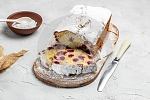 Dough cake with berries for dessert, cupcake sweet bread with cherries, Homemade sponge cake or chiffon cake on white table.