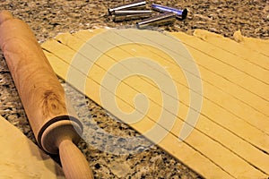 Dough cut into stripes