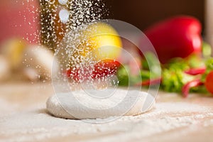 Dough for Italian pizza preparation photo