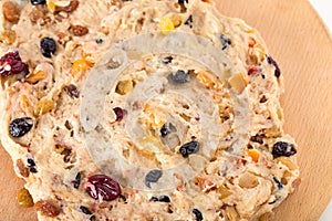 Dough for pie on a wooden surface.