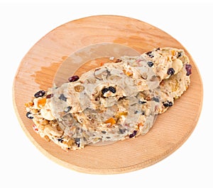 Dough for pie on a wooden tray.