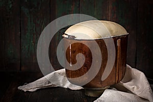 Dough rises in the bowl