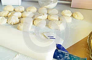 Dough, rolling pin, flour for making fresh homemade cakes