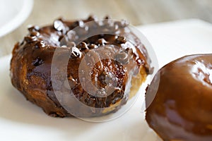 Doughnut server on plate with rustic background