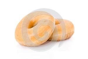 Doughnuts or donuts isolated on white