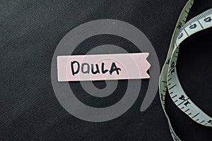 Doula write on sticky notes isolated on office desk