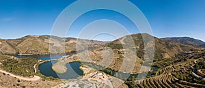 Douro valley wine region, Portugal. Vineyards landscape with beautiful farm. Tourist attraction and travel destination. Drone aeri