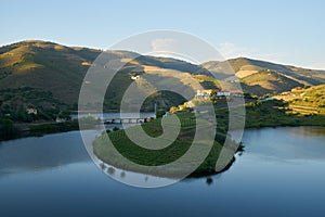 Douro wine valley region s shape bend river in Quinta do Tedo at sunset, in Portugal