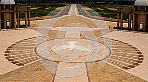 The dove ensignia in the front courtyard of the Basilica of Our Lady of Peace Yamoussoukro Ivory Coast photo
