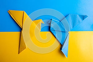 doves as a symbol of peace on blue yellow background, flag of Ukraine.