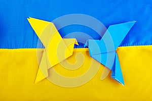 doves as a symbol of peace on blue yellow background, flag of Ukraine. The concept of participation of the Ukrainian people in the