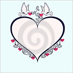 Doves with heartshaped frame.