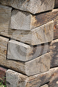 Dovetail joint at corner of wooden house photo