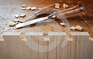 Dovetail joint hand made by chisels. photo