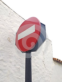 Down angle view of Traffic red sign with white rectangle Entry is prohibited, icon for prohibiting to drive pass on city