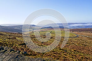 Down the steep slopes of Stanage Edge and across the fieldss and valleys of Derbyshire