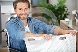 down syndrome man doing laundry