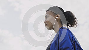 Down view of female runner getting ready to run