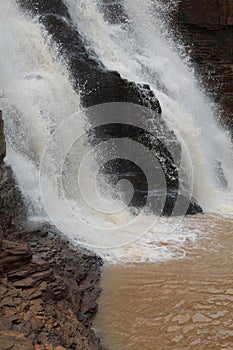 Down View of Tirathgarh Waterfall with Rocks at the edge