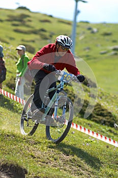 Downhill racer in red