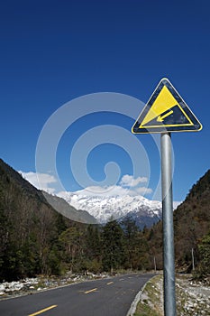 Downhill road sign