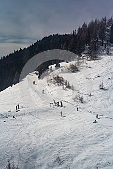 Downhill skier on mountain slope