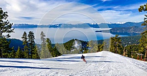 Downhill skiing above Lake Tahoe