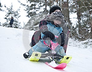 Downhill on a snow sledge