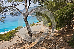 Downhill to sand dunes of Agios Pavlos beach from e4 trail between Loutro and Agia Roumeli at south-west od Crete island