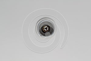 A downlight on the white ceiling