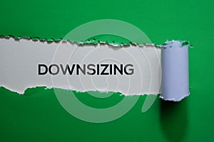Downsizing Text written in torn paper