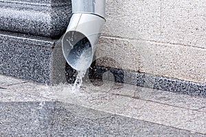 Downspout in heavy rain